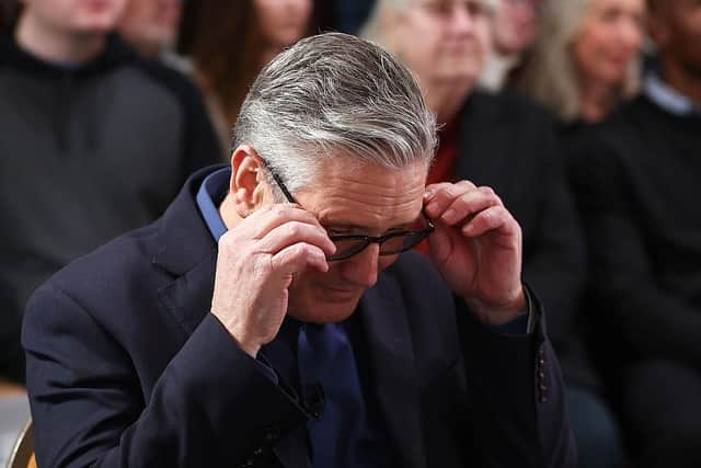 Keir Starmer's troubles were compounded yesterday when Scottish Labour leader Anas Sarwar called upon him to step down (Picture: Peter Nicholls/Getty Images)