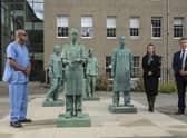 (L-R) Nirmal Kumar, Clare McNaught, Professor Michael Griffin at an unveiling of  a new sculpture which they helped to inspire at the Royal College of Surgeons of Edinburgh grounds