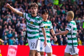 Celtic's Matt O'Riley celebrates after making it 3-0 against Livingston.