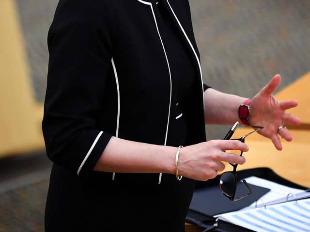 Scotland's First Minister Nicola Sturgeon attends a session at the Scottish Parliament where she delivered an update on the Covid-19 pandemic, in Holyrood, Edinburgh on March 9, 2021. (Photo by Andy Buchanan / POOL / AFP).