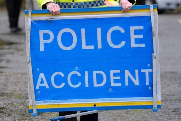 A 26-year-old woman was rushed to hospital after a crash on the M80.