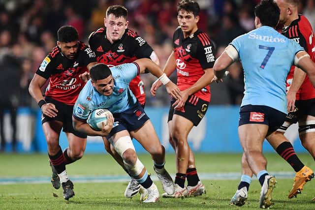 Mosese Tuipulotu, pictured with ball in hand playing for the Waratahs against the Crusaders in Super Rugby, has joined Edinburgh. (Photo by Sanka Vidanagama / AFP via Getty Images)