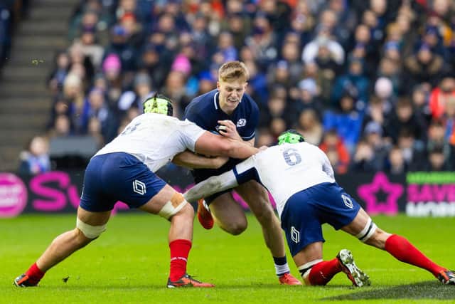 Scotland's Harry Paterson goes up against France's Francois Cros and Gregory Alldritt.