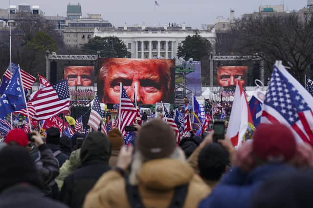 Supporters of President Donald Trump participate in a rally in Washington. Picture: AP Photo/John Minchillo, File