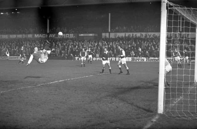 Acrobatically keeping Hearts at bay for boyhood heroes Hibs in his last-ever derby in March, 1976.