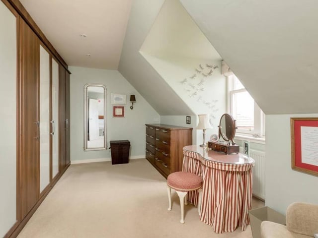 Principal bedroom dressing room.