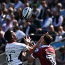Scotland winger Sean Maitland and Tom Roebuck - who may represent the Scots in the future - challenge for the ball.