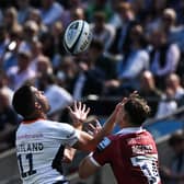 Scotland winger Sean Maitland and Tom Roebuck - who may represent the Scots in the future - challenge for the ball.