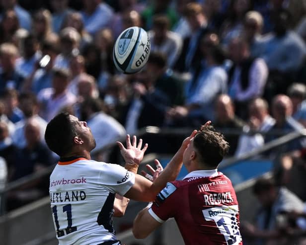 Scotland winger Sean Maitland and Tom Roebuck - who may represent the Scots in the future - challenge for the ball.