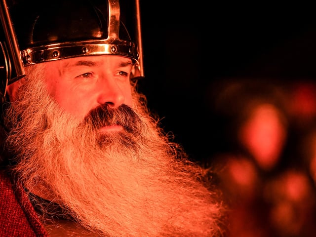Richard Moar, 47, is the chief jarl and surveys the scene at the Up Helly Aa festival. Picture: Andy Buchanan/AFP via Getty Images