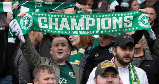 A Celtic supporter comes prepared for a celebratory afternoon for his club. (Photo by Craig Williamson / SNS Group)