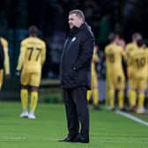 Celtic manager Ange Postecoglou is left dejected as Bodo/Glimt celebrate their Europa Conference League first leg win at Celtic Park last week. (Photo by Craig Williamson / SNS Group)