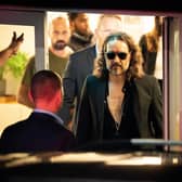 Russell Brand leaves the Troubabour Wembley Park theatre in north-west London after performing a comedy set. Picture: James Manning/PA Wire