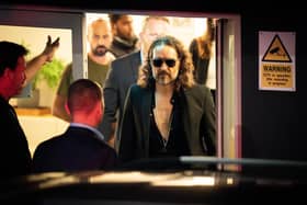 Russell Brand leaves the Troubabour Wembley Park theatre in north-west London after performing a comedy set. Picture: James Manning/PA Wire