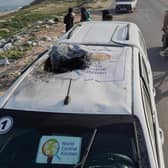 A car used by US-based aid group World Central Kitchen, that was hit by an Israeli strike (Photo by AFP)