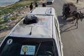 A car used by US-based aid group World Central Kitchen, that was hit by an Israeli strike (Photo by AFP)