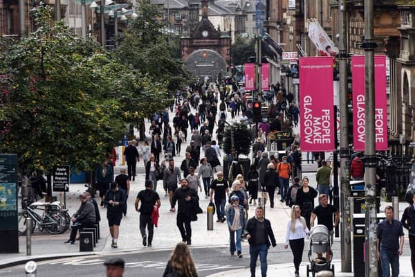 Groups representing Scottish businesses have written council leaders calling for town and city centre parking charges to be waived ahead of Christmas. (Photo by Andy Buchanan / AFP)