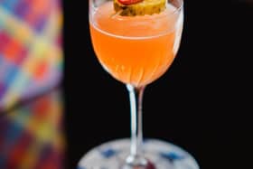 MAIN CHARACTER MARG -  El Rayo tequila, Amaro Montenegro, Aperol, house pickle blend, chili, lemon juice