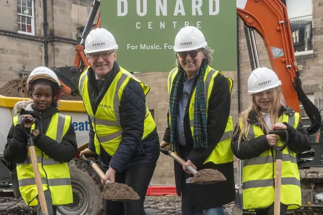 First Minister John Swinney at the Dunard ground breaking with musician Dougie MacLean and schoolchildren