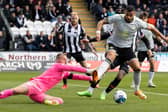 Celtic's Giorgos Giakoumakis (R) and St Mirren goalkeeper Trevor Carson during a cinch Premiership match between St. Mirren and Celtic at the SMiSA Stadium, on September 18, 2022, in Paisley, Scotland.  (Photo by Alan Harvey / SNS Group)