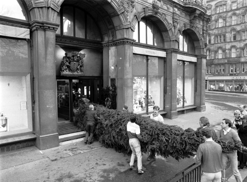 Jenners has boasted the best Christmas decorations since it began trading - here you can see a 40 foot Christmas tree being delivered in November. Year: 1987