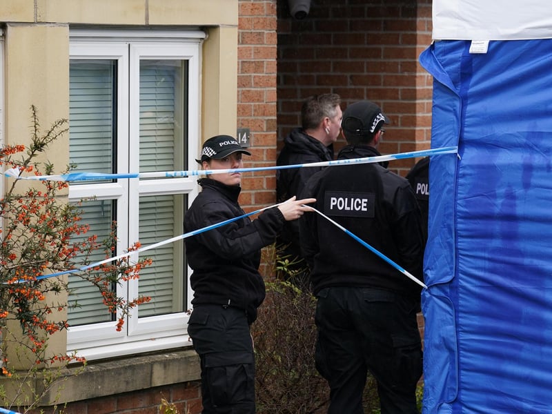 Blue sheeting has also been put up to screen the house from view and a police cordon has been put in place around the property.