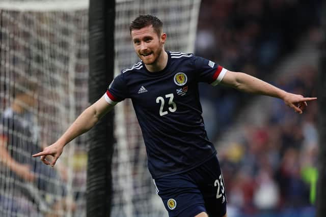Anthony Ralston of Scotland celebrates after he scores the opening goal during the UEFA Nations League League B Group 1 match between Scotland and Armenia at Hampden.