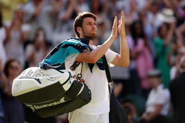 Cameron Norrie leaves the court after defeat to Novak Djokovic in the Wimbledon semi-final. (Photo by Ryan Pierse/Getty Images)