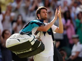 Cameron Norrie leaves the court after defeat to Novak Djokovic in the Wimbledon semi-final. (Photo by Ryan Pierse/Getty Images)