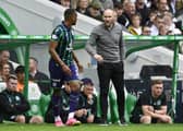 Hibs manager David Gray speaks to Jordan Obita during the Premier Sports Cup defeat at Celtic.  (Photo by Rob Casey / SNS Group)