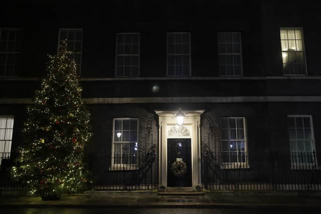 A view of the Christmas tree outside 10 Downing Street in London as people wait for news on Brexit trade talks