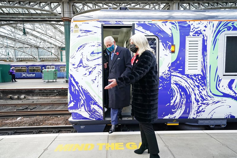 The Prince of Wales inspects a hydrogen powered train as he visits Glasgow Central Station during the Glasgow COP26 Summit in November 2021.