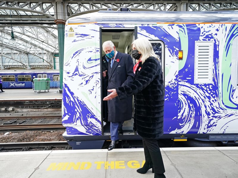The Prince of Wales inspects a hydrogen powered train as he visits Glasgow Central Station during the Glasgow COP26 Summit in November 2021.