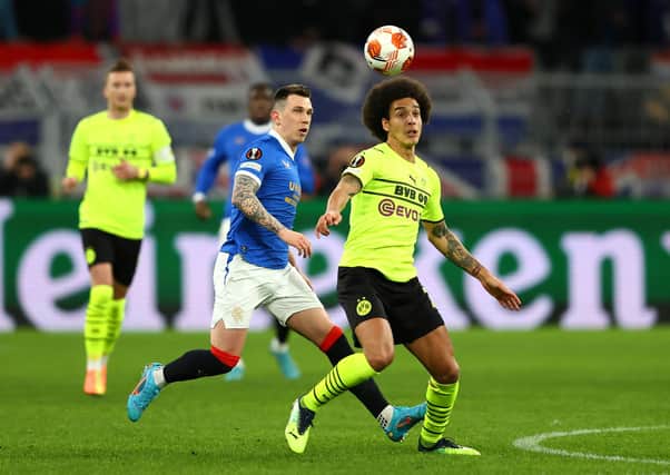 Rangers midfielder Ryan Jack in action against Axel Witsel of Borussia Dortmund during the Europa League match in Germany on Thursday. (Photo by Martin Rose/Getty Images)