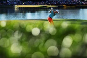 Russell Knox hits his tee shot at the iconic 17th hole on the Stadium Course at TPC Sawgrass during the third round of the The Players Championship in 2016. Picture: Richard Heathcote/Getty Images.