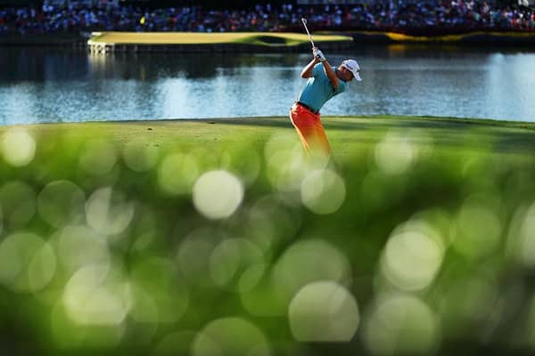 Russell Knox hits his tee shot at the iconic 17th hole on the Stadium Course at TPC Sawgrass during the third round of the The Players Championship in 2016. Picture: Richard Heathcote/Getty Images.