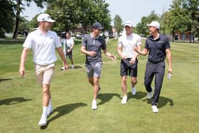 Home player Yannik Paul, left, and defending champion Haotong Li share a laugh with football legends Gareth Bale and Thomas Muller at Golfclub Munchen in the build up to  
the BMW International Open. Picture: Stefan Heigl