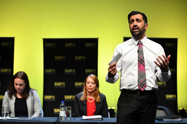 Humza Yousaf (right) taking part in the first SNP leadership hustings in Cumbernauld.