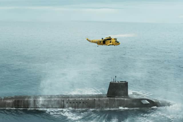 A helicopter hovers above HMS Vigil in the hit BBC TV drama. Picture: BBC/World Productions