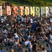 Festivalgoers attend the Glastonbury festival near the village of Pilton in Somerset, southwest England, on June 22, 2022.