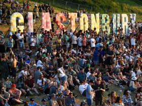 Festivalgoers attend the Glastonbury festival near the village of Pilton in Somerset, southwest England, on June 22, 2022.