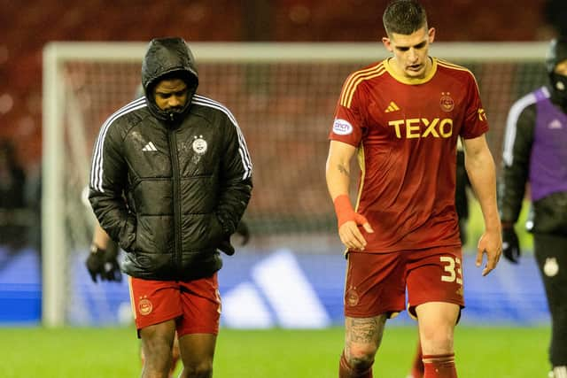 Aberdeen's Luis Lopes (L) and Slobodan Rubezic look dejected after losing to St Mirren.