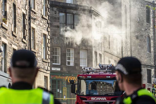 Firefighters attend a blaze on George IV bridge in 2021. Picture: Lisa Ferguson




Fire crews have been tackling a large blaze which broke out at Edinburgh's George IV Bridge.



Police Scotland closed several roads in the city's old town on Tuesday morning and said officers were assisting the Scottish Fire and Rescue Service .



The alarm was raised shortly after 6am by a cleaner at Edinburgh's Elephant House cafe - where JK Rowling penned her first Harry Potter book.



It is believed the fire started in the Patisserie Valerie cafe next door.



Elephant House owner David Taylor, said the fire had not spread to the building, but it had suffered smoke and water damage.