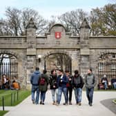 Students outside of the entrance to the Lower and Upper College Halls at the University of St Andrews. Picture: PA