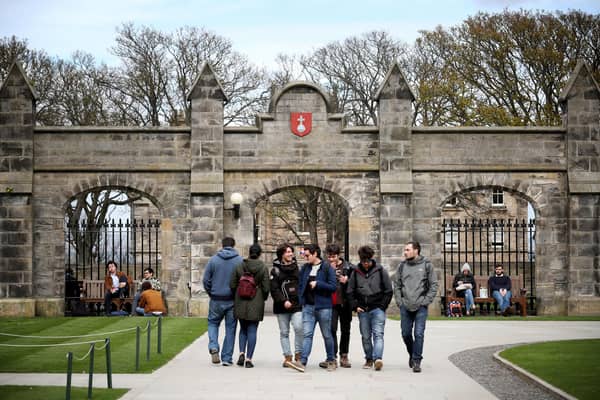 Students outside of the entrance to the Lower and Upper College Halls at the University of St Andrews. Picture: PA