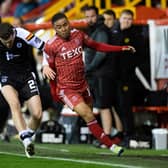 Aberdeen's Vicente Besuijen (right) is challenged by Partick's Jack McMillan in the Premier Sports Cup quarter-final clash at Pittdorie. (Photo by Mark Scates / SNS Group)