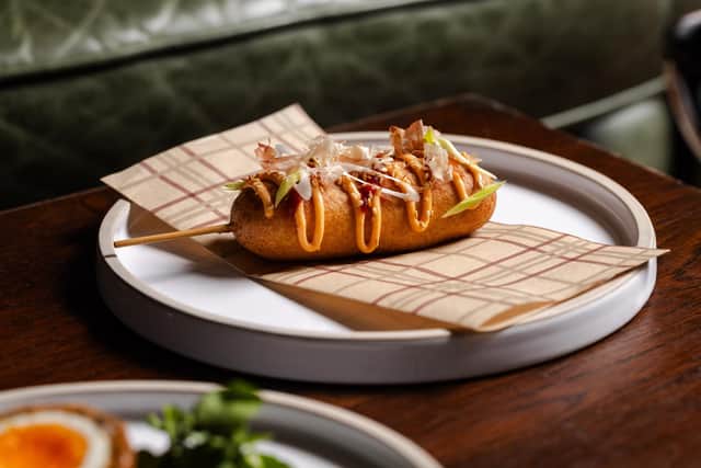 One of the new dishes is a prawn corn dog.