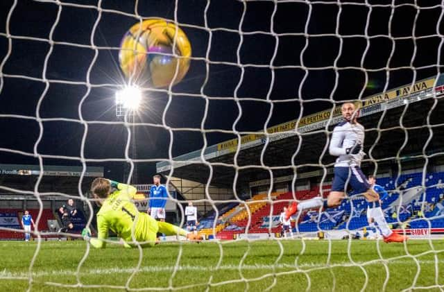 Rangers in-form striker Kemar Roofe, pictured scoring his 11th goal of the season in the 3-0 win at St Johnstone on Wednesday, will pose a major threat to the Hibs defence. (Photo by Rob Casey / SNS Group)