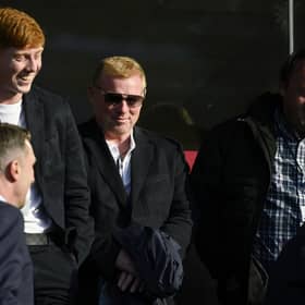 Neil Lennon and son Gallagher watch last season's Premiership play-off tie between Queen's Park and Partick Thistle at Ochilview. The former Hibs manager was back at Easter Road yesterday. (Photo by Rob Casey / SNS Group)