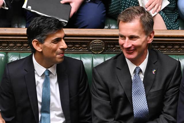 Prime Minister Rishi Sunak (left) and Chancellor of the Exchequer Jeremy Hunt during Prime Minister's Questions in the House of Commons, London.